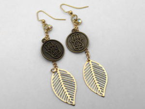 the golden hamsa dangles earrings