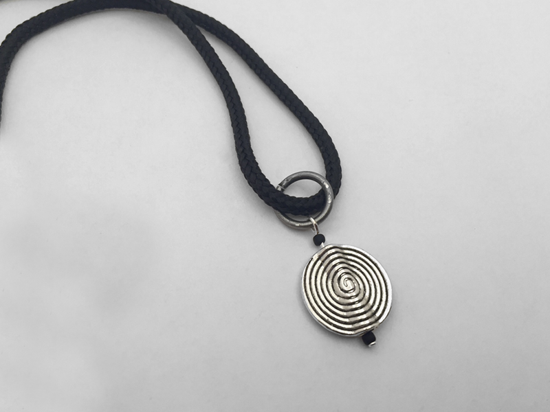 image representing the mystik spiral charm Array